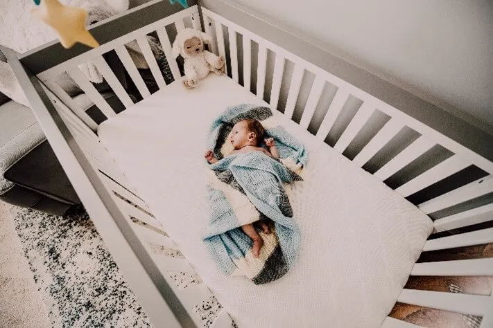 Baby in bed