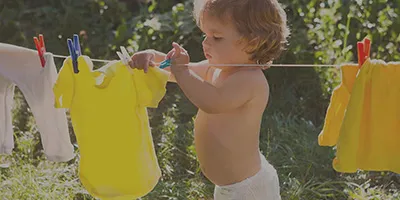 Kinderkleren opbergen en wassen
